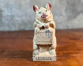 This lot features a J.M.R. Hubley No. 82 cast iron “Thrifty Wise Pig” piggy bank that measures, 6.5” H.

