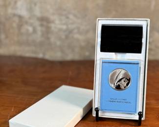 This lot features a Halley’s Comet medal by The Franklin Mint, featuring a limited edition solid sterling silver round. Comes with a certificate of authenticity.

