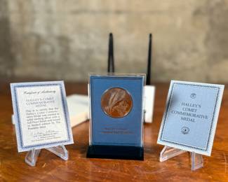 This lot features a Halley’s Comet medal by The Franklin Mint, featuring a limited edition solid sterling silver round. Comes with a certificate of authenticity.

