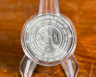 This lot features an Apollo 11 50th Anniversary silver round that contains one (1) troy ounce of .999 fine silver. It commemorates the 50th anniversary of the Apollo 11 moon landing and includes the famous quote, “That’s one small step for a man, one giant leap for mankind”. 


