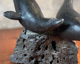 "Seals on a Rock", a vintage Inuit sculpture that measures, 13.5” H. Likely from the mid-20th century.

