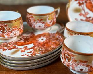 
This lot features a beautiful Japanese Kutani porcelain tea and snack set. The set features a vibrant, hand-painted design with a peacock and peonies motif. 

It is made of delicate "eggshell" porcelain. The entire set comes in excellent condition and includes six (6) cups and plates.
