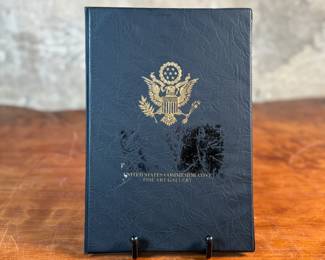 This lot features a 2001 Solid Silver Remembrance Dollar, containing one (1) troy ounce of .999 fine silver. It is a United States commemorative coin minted in 2001.

