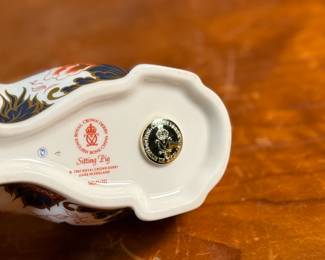 This lot features a Royal Crown Derby Imari-patterned "Sitting Pig" in excellent condition.

