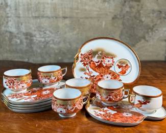 
This lot features a beautiful Japanese Kutani porcelain tea and snack set. The set features a vibrant, hand-painted design with a peacock and peonies motif. 

It is made of delicate "eggshell" porcelain. The entire set comes in excellent condition and includes six (6) cups and plates.
