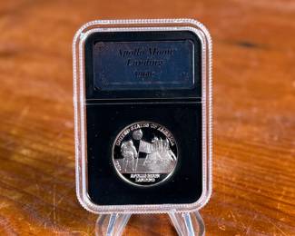 This lot features a 1/2 troy ounce .999 fine silver round, commemorating the Apollo moon landing. 

