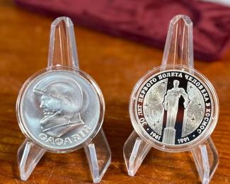 The medal on the left depicting Yuri Gagarin was minted from the metal of a space craft actually flown into space. The Proof 3 Rouble coin on the right is minted in .900 fine silver (current melt: $18.68, Book $45) and pays tribute to the Yuri Gagarin monument. Accompanied with a certificate of authenticity and comes in the original presentation case.

