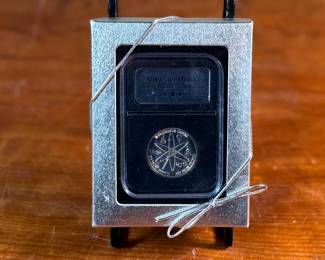 This lot features a 1/2 troy ounce .999 fine silver round, commemorating the Apollo moon landing. 

