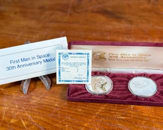 The medal on the left depicting Yuri Gagarin was minted from the metal of a space craft actually flown into space. The Proof 3 Rouble coin on the right is minted in .900 fine silver (current melt: $18.68, Book $45) and pays tribute to the Yuri Gagarin monument. Accompanied with a certificate of authenticity and comes in the original presentation case.

