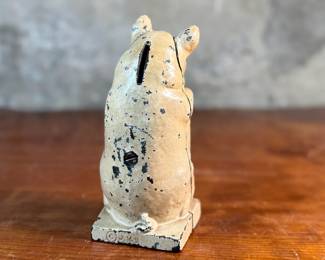 This lot features a J.M.R. Hubley No. 82 cast iron “Thrifty Wise Pig” piggy bank that measures, 6.5” H.

