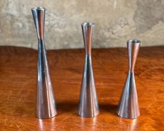This lot features a set of three (3) vintage candlesticks designed by Erika Pekkari for Ikea in the late 1990s. The tallest measures, 10.5” H.

