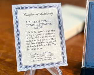 This lot features a Halley’s Comet medal by The Franklin Mint, featuring a limited edition solid sterling silver round. Comes with a certificate of authenticity.

