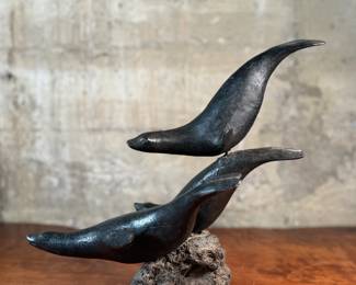 "Seals on a Rock", a vintage Inuit sculpture that measures, 13.5” H. Likely from the mid-20th century.

