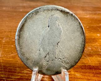 This lot features a 1923 Peace dollar.

