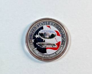 This lot features a 2001 Solid Silver Remembrance Dollar, containing one (1) troy ounce of .999 fine silver. It is a United States commemorative coin minted in 2001.

