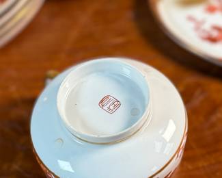 
This lot features a beautiful Japanese Kutani porcelain tea and snack set. The set features a vibrant, hand-painted design with a peacock and peonies motif. 

It is made of delicate "eggshell" porcelain. The entire set comes in excellent condition and includes six (6) cups and plates.
