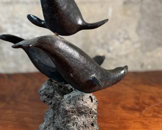 "Seals on a Rock", a vintage Inuit sculpture that measures, 13.5” H. Likely from the mid-20th century.

