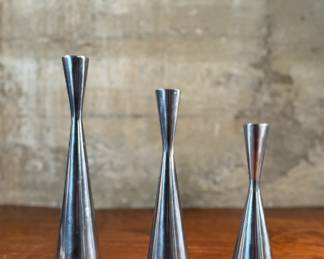 This lot features a set of three (3) vintage candlesticks designed by Erika Pekkari for Ikea in the late 1990s. The tallest measures, 10.5” H.

