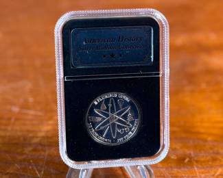 This lot features a 1/2 troy ounce .999 fine silver round, commemorating the Apollo moon landing. 

