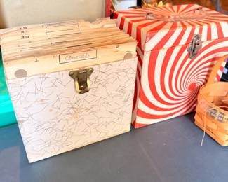 Several 45 records in sleeves and with a case