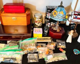 Vintage costume jewelry, Dale Tiffany Calypso Tiffany Table Lamp, a Tiffany-style stained glass bankers lamp, Willow Tree Angel of Healing and vintage jewelry cases. 