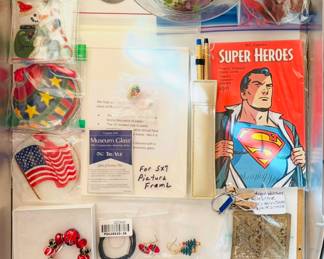A vintage Cross Century 14kt gold-filled ballpoint pen and mechanical pencil set, a set of DC Comics Super Heroes 20 postal cards, authentic retired Pandora 925 ALE sterling silver, Disney Minnie Mouse watch, and a collection of Peggy Karr ornaments. 