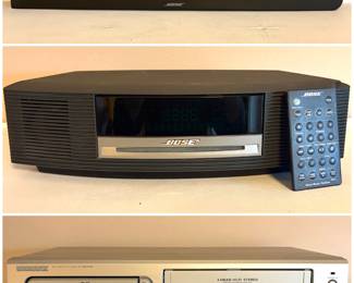 Bose Solo Soundbar Series II, a Bose Wave Music System, and a Magnavox MDV530VR DVD/VCR Combo player with its original remote. 