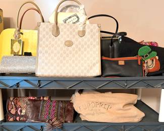 Gucci GG Supreme Interlocking G small tote bag, an Arcadia patent leather dome satchel bag in butter yellow,  a silver rhinestone clutch bag, a black Dooney & Bourke Pebble Grain leather handbag and Myra brand upcycled canvas and leather handbags and a weekender bag. 