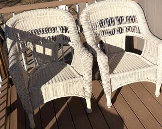 Two matching all weather resin wicker patio armchairs. Wide variety of new and like new outdoor patio cushions also available for sale. 