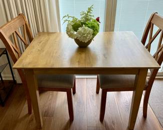 Square Wood Dining Table with Two Cross-Back Chairs