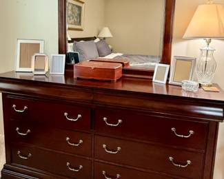 Dark Wood Six-Drawer Dresser with Attached Mirror