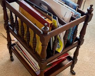 Vintage Wooden "Canterbury" Magazine/Music Rack
with Turned Spindles, Central Handle, and a Lower Shelf on Casters