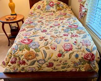 Twin Bed with Jacobean Floral Pattern Quilt