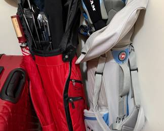 Two Bags with Various Brand Named Golf Clubs