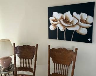 pressed back chairs, wall art, magazines