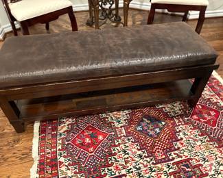 . . . nice leather-topped bench