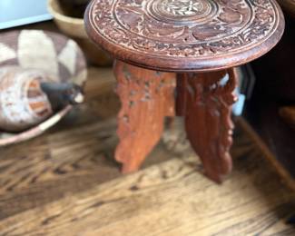 . . . hand-carved stool