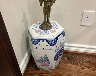 . . . Asian-themed stand with icon 