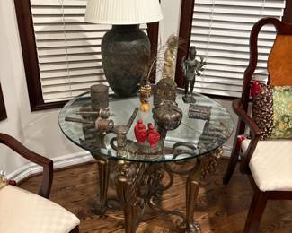 . . . glass table top on lion-themed base