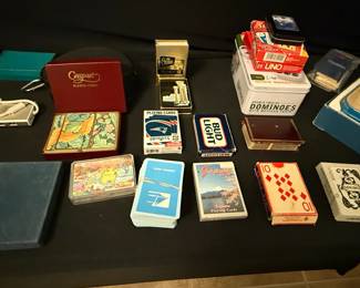Assorted Lot of Playing Cards and Game Items including Pan Am, Patriots, Bud Light, Gaspari, UNO, and Dominoes
