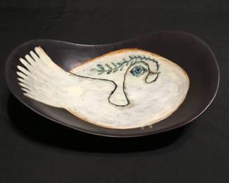 Glazed ceramic bowl showing a dove of peace with olive branch