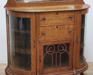 Vintage tiger oak display cabinet with curved