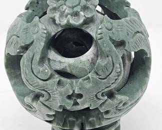 Hand-carved Chinese jade puzzle ball on stand