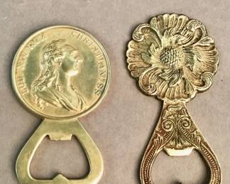 Pair of vintage heavy cast brass bottle openers
