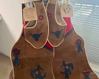 Vintage..1950s child’s cowboy outfit
* chaps * shirt *vest *hat
* holster w/ gun * sheriffs star badge