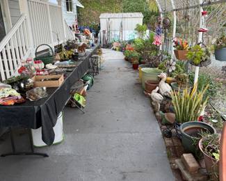 Garden decor, plants and tools.  Plant Stands and pottery.