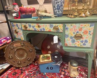 Vinage desk/vanity with rice paper accents and gold touches over the embellished parts of the piece, vegetable trivet, vintage juicer