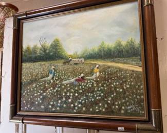 Framed oil painting with brass corners