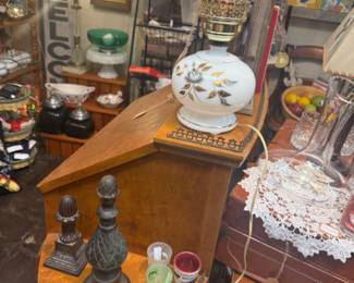 vintage secretary, flickering oil lamp, doilies, welcome sign