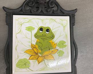 Vintage Sears roebuck “Neil the Frog” cast iron and ceramic tile trivet, 1970s
